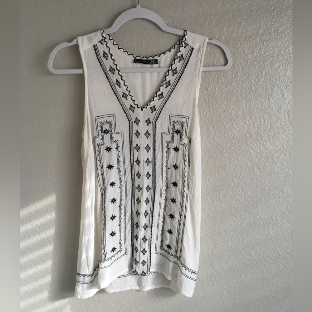 Black Tape_ White Sleeveless V-Neck Tank with Black Embroidery